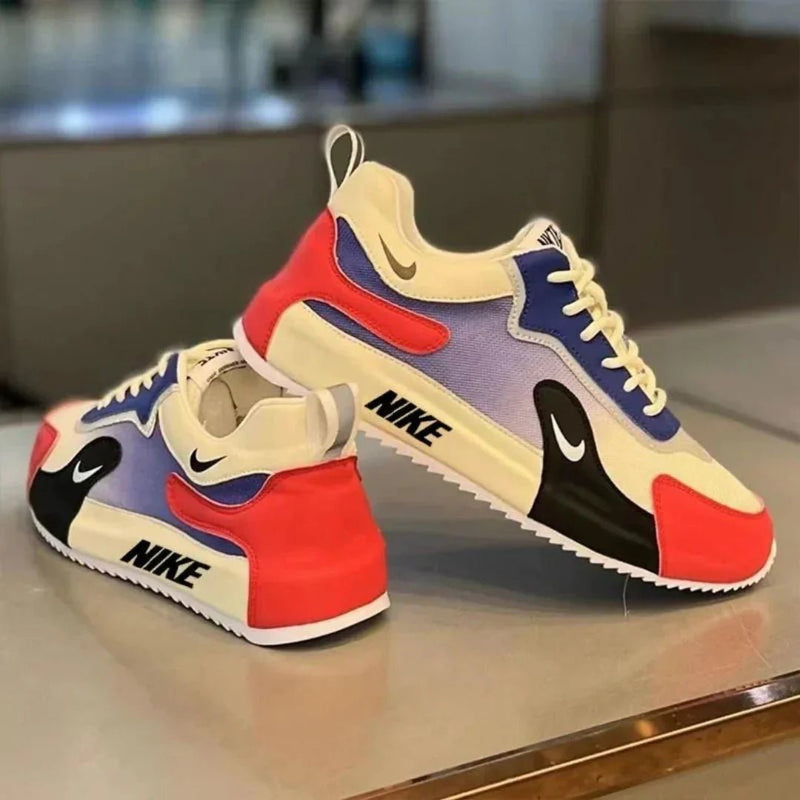 Nike – Sneakers avec panneaux contrastants