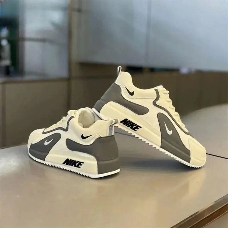 Nike – Sneakers avec panneaux contrastants